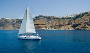 Barca's sailing boat on a private morning excursion at santorini